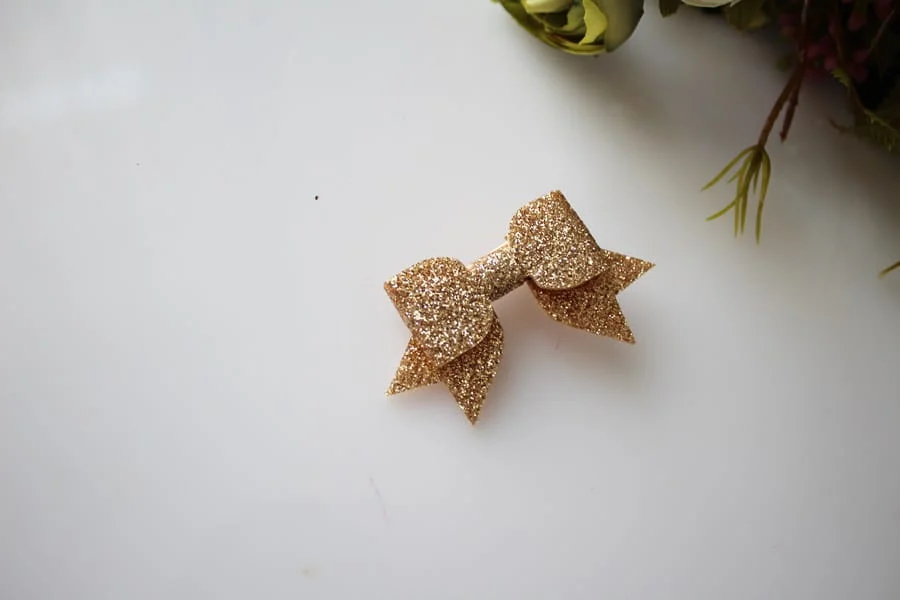 Spinka mini brokatowa kokardka ZŁOTA