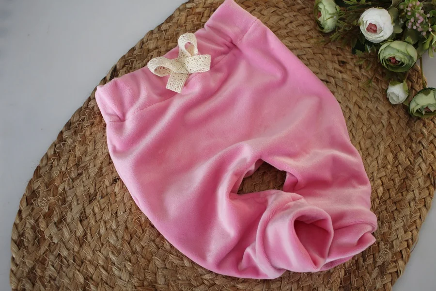 Spodnie niemowlęce dziewczynka  welur kokardka koronka baggy barbie róż